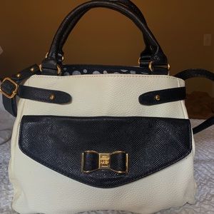Lulu’s White and Black Leather Purse